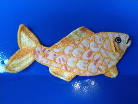 Orange fish against a blue background