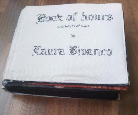 The cover is white, with the words written in a black gothic script