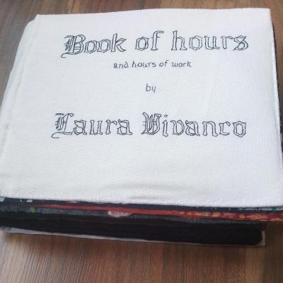 The cover is white, with the words written in a black gothic script